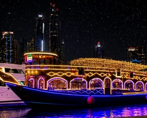 Traditional Sunset dhow cruise on Dubai Creek at Al Seef at sunset