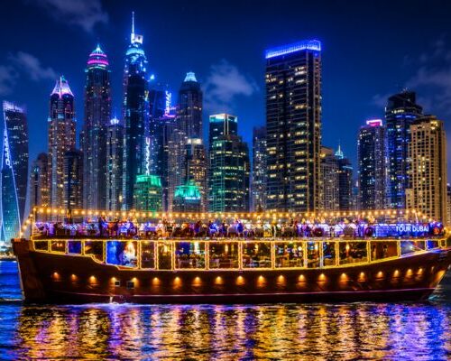 Luxury dhow dinner cruise Dubai Marina at night with skyline Luxury dhow dinner cruise Dubai Marina at night with skyline
