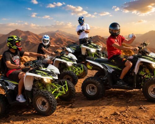 Luxury quad bike riding on red sand dunes during premium desert safari in Dubai